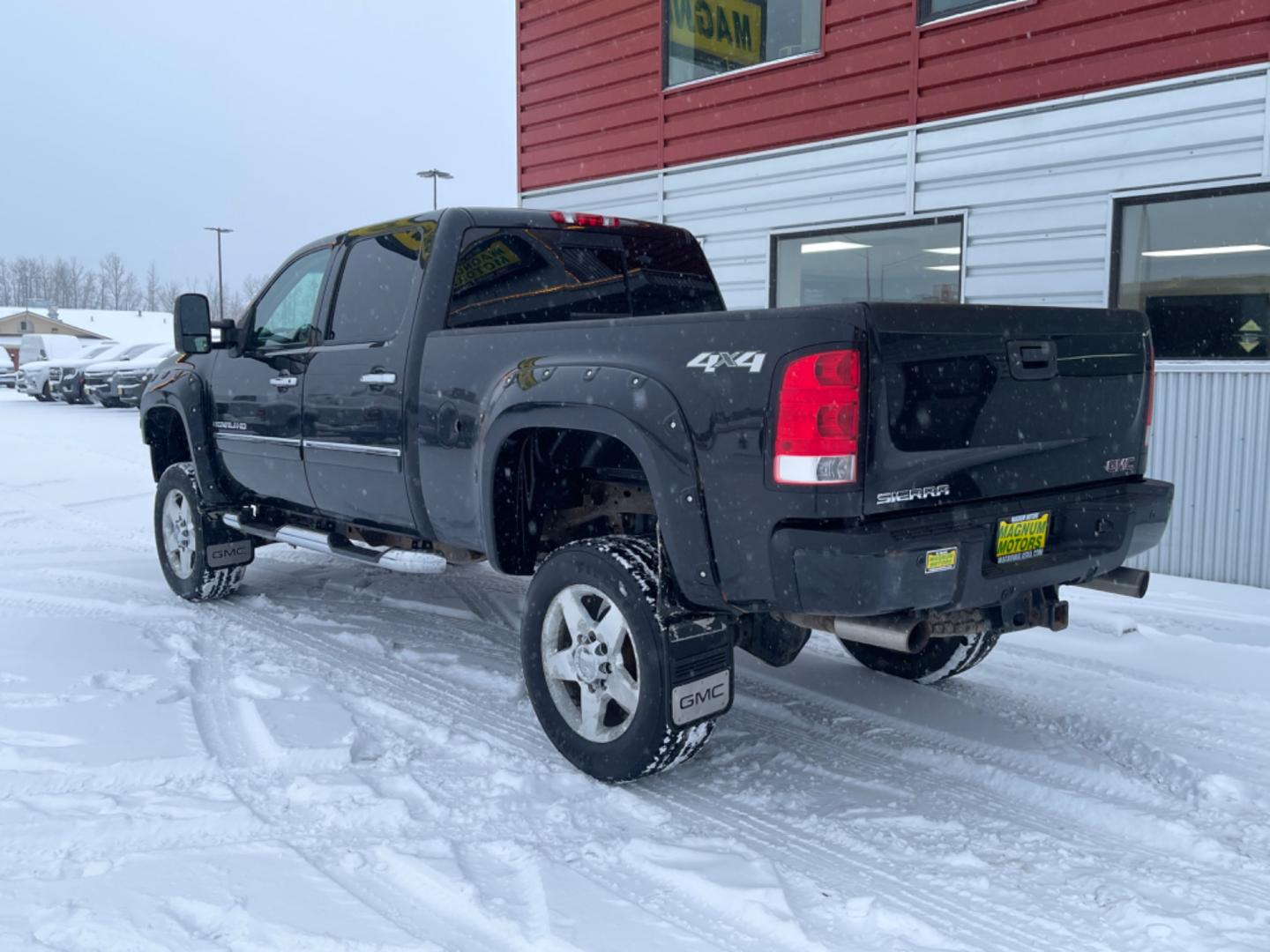 2014 Black /black leather GMC Sierra 2500HD Denali Crew Cab 4WD (1GT125EGXEF) with an 6.0L V8 OHV 16V FFV engine, 6-Speed Automatic transmission, located at 1960 Industrial Drive, Wasilla, 99654, (907) 274-2277, 61.573475, -149.400146 - Photo#2